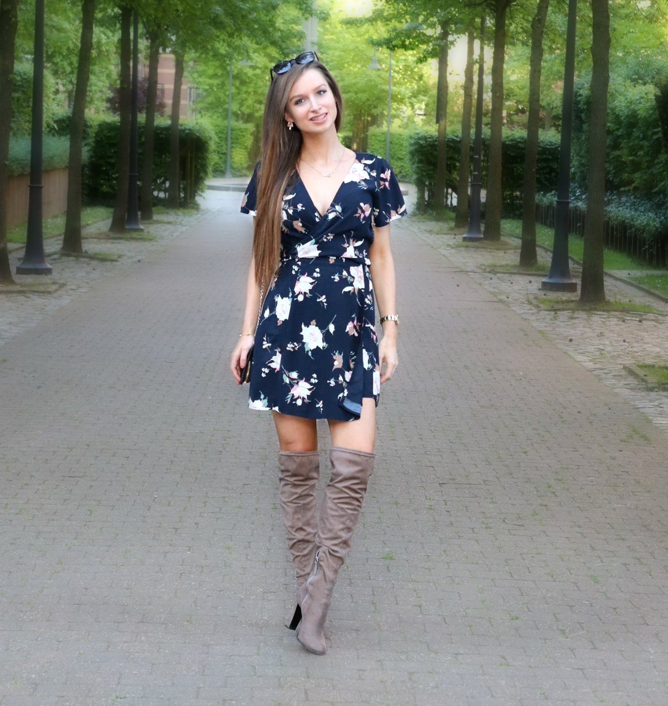Abercrombie floral dress with over the knee boots and sunglasses